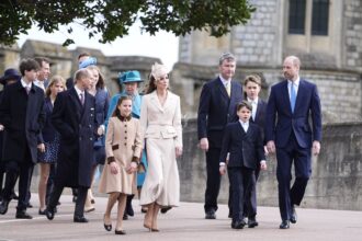 The British Royal Family walking as they arrive at the Easter service