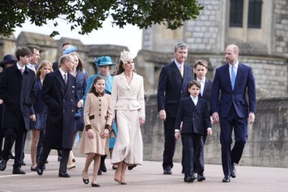 The British Royal Family walking as they arrive at the Easter service