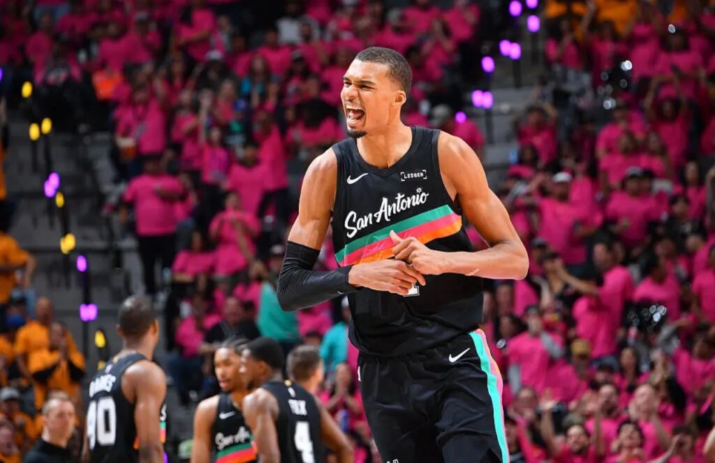 The great French player celebrating enthusiastically after a big play or a team victory.