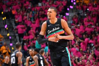 The great French player celebrating enthusiastically after a big play or a team victory.