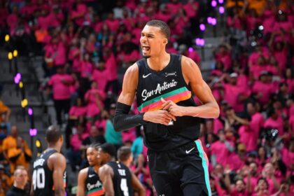 The great French player celebrating enthusiastically after a big play or a team victory.