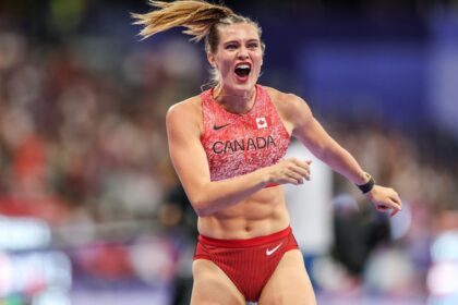 The famous Canadian athlete celebrating euphorically after one of her competitions.
