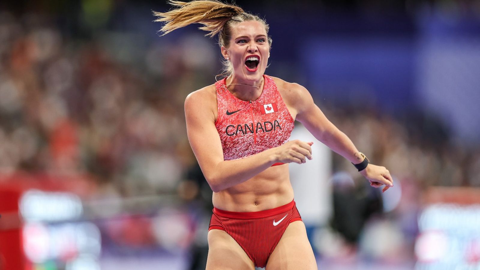 The famous Canadian athlete celebrating euphorically after one of her competitions.