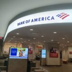 One of the Bank of America offices with several of its cubicles and the logo displayed above all of them