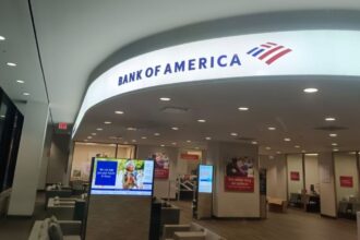 One of the Bank of America offices with several of its cubicles and the logo displayed above all of them