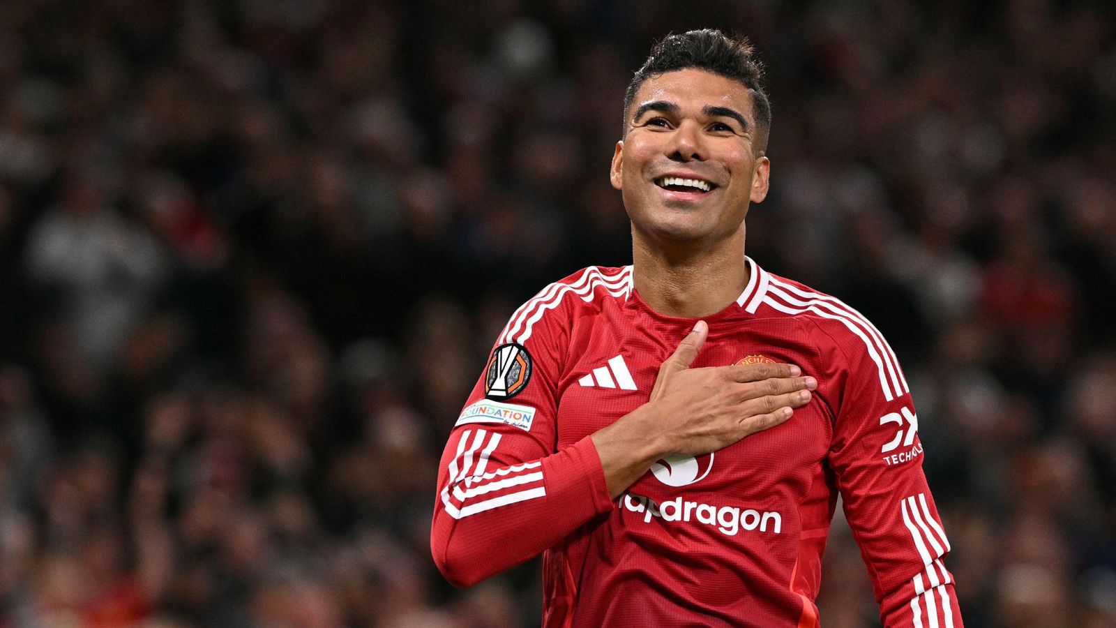The experienced Brazilian midfielder wearing the red Manchester United uniform