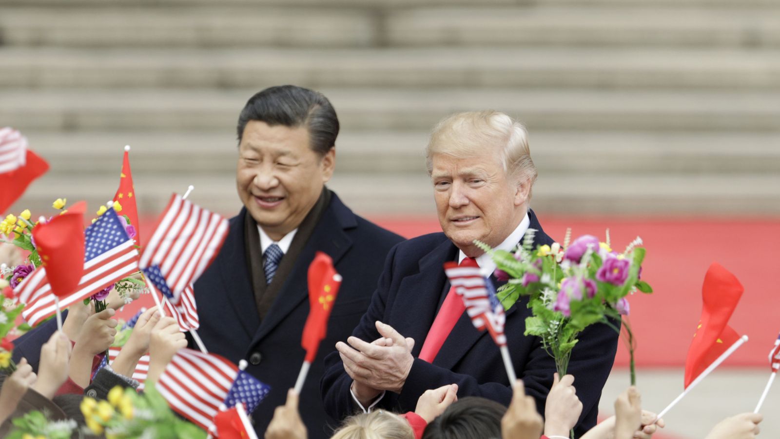 Donald Trump lands in China for a key summit with Xi Jinping