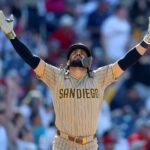 Tatis celebrating while looking toward the sky after hitting his first home run of 2026.