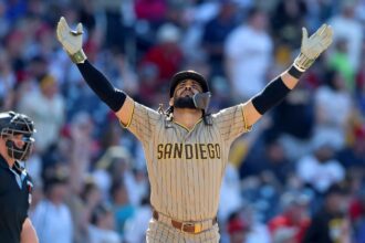 Tatis celebrating while looking toward the sky after hitting his first home run of 2026.