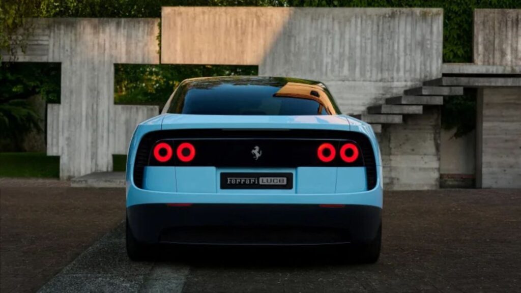Ferrari speeds into the future with the development of its first electric car The new electric Ferrari car, seen from the back with a beautiful light blue color and the striking horse logo.