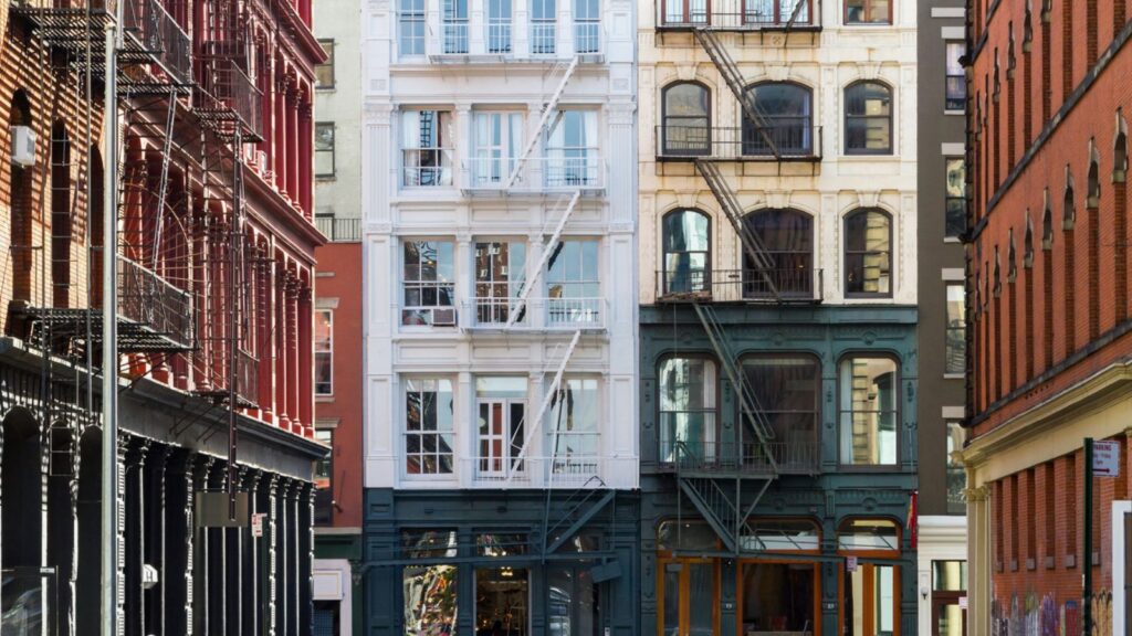 A panoramic image of houses and apartment buildings in New York City.
