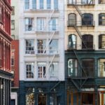 A panoramic image of houses and apartment buildings in New York City.