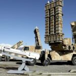 Different military vehicles loaded with Iranian rockets ready for launch orders.