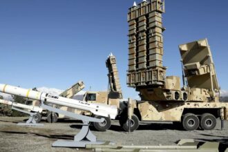 Different military vehicles loaded with Iranian rockets ready for launch orders.
