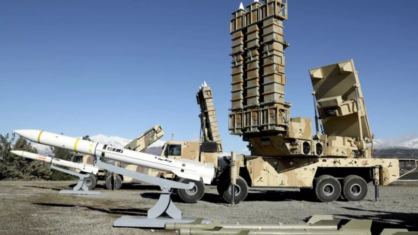 Different military vehicles loaded with Iranian rockets ready for launch orders.