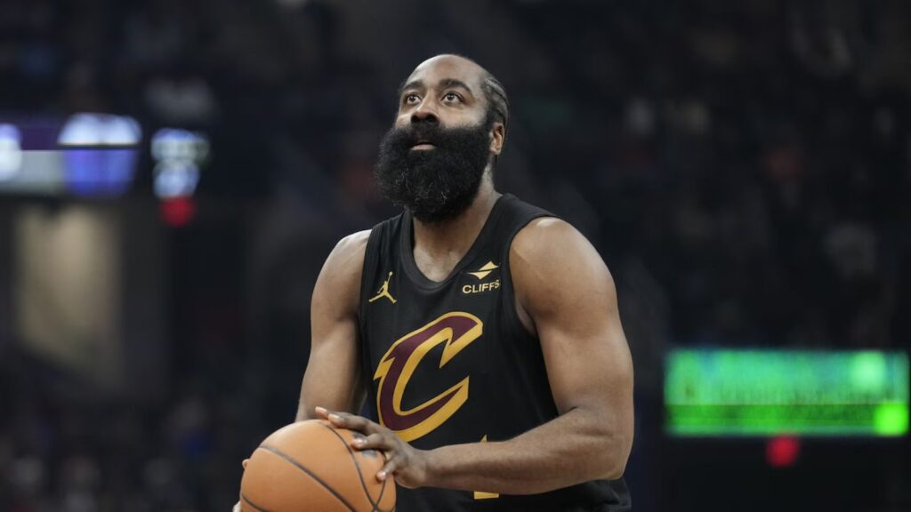 The experienced Cleveland Cavaliers player at the free-throw line preparing to make a shot.
