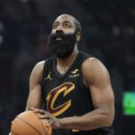The experienced Cleveland Cavaliers player at the free-throw line preparing to make a shot.