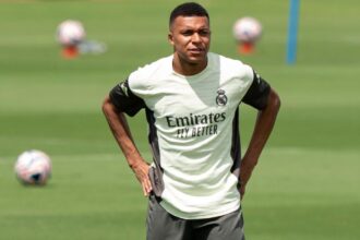 The French player wearing the Real Madrid training kit.