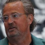 Matthew Perry’s assistant sentenced to 3 years and 5 months in prison in ketamine-related case The Matthew Perry actor from Friends posing for the cameras with long hair and eye-catching glasses.