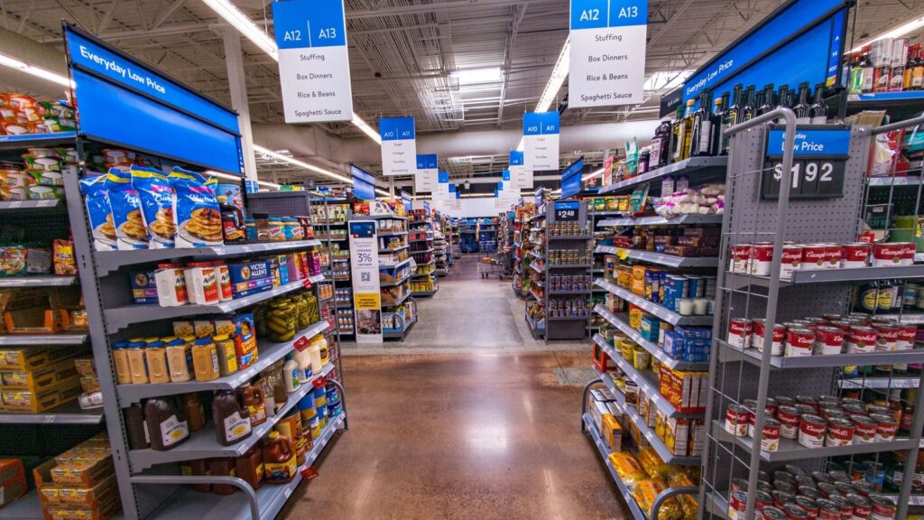 A photo of an aisle inside one of Walmart’s stores with different products.