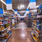 A photo of an aisle inside one of Walmart’s stores with different products.
