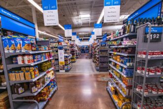 A photo of an aisle inside one of Walmart’s stores with different products.