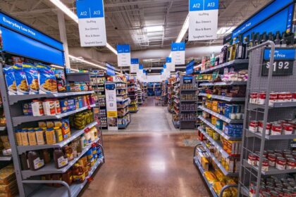 A photo of an aisle inside one of Walmart’s stores with different products.