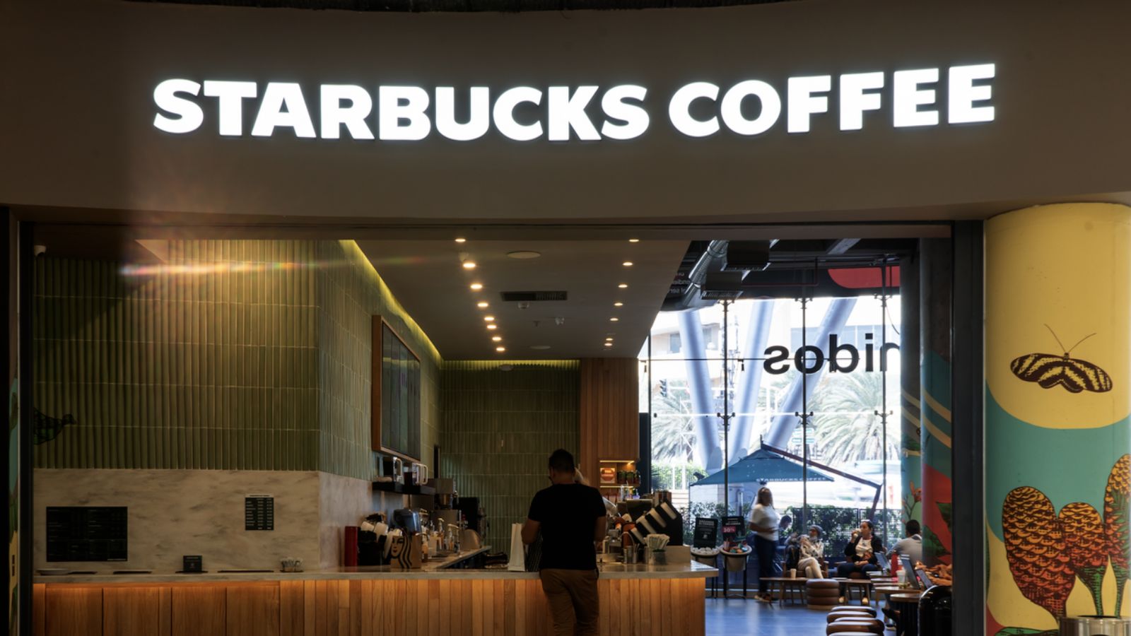 Starbucks will lay off 300 workers and close offices in several cities across the United States