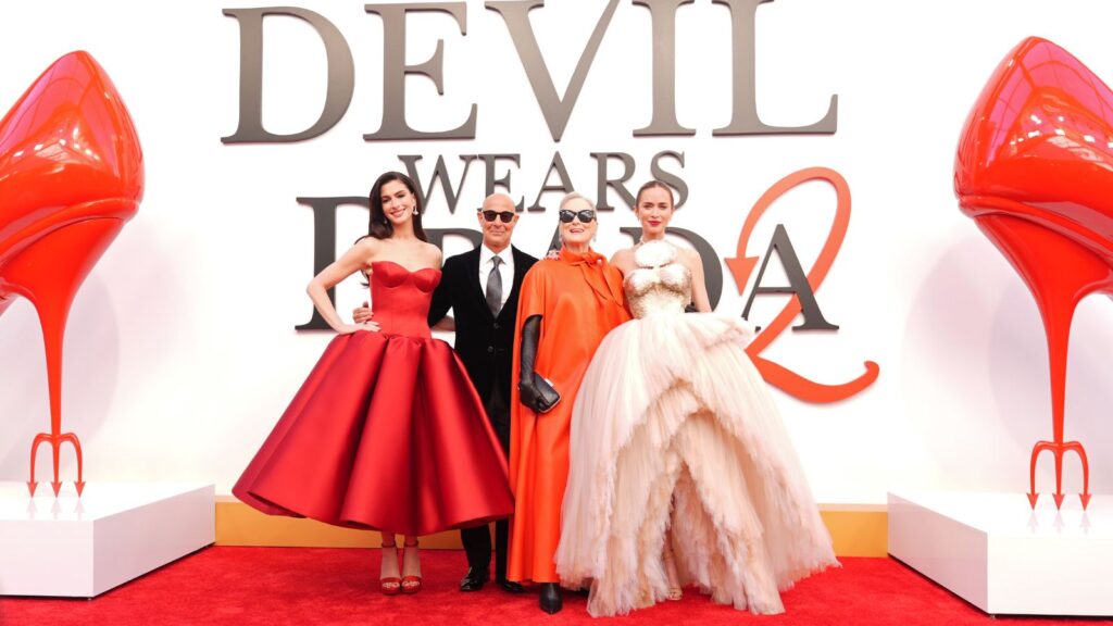 The stars of the iconic movie on a promotional red carpet for the same film.