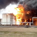 A Russian oil facility on fire after the Ukrainian attack.