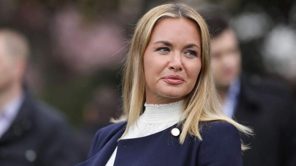 Vanessa Trump smiling at one of her events while greeting those in attendance.