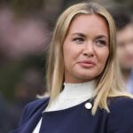 Vanessa Trump smiling at one of her events while greeting those in attendance.