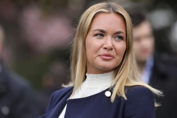 Vanessa Trump smiling at one of her events while greeting those in attendance.
