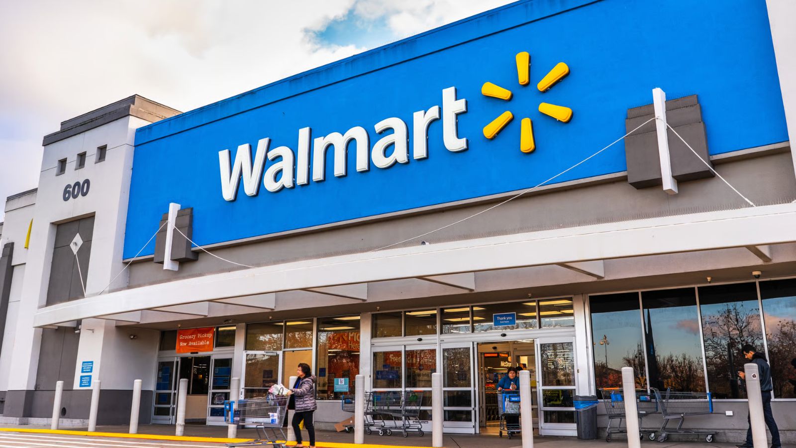 One of the Walmart stores viewed from the front with its iconic yellow and blue colors.