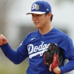 Yoshinobu Yamamoto preparing on the mound to throw one of his pitches.