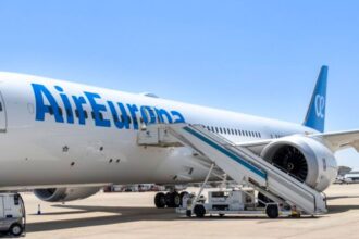 An Air Europa aircraft at an airport welcoming passengers on board