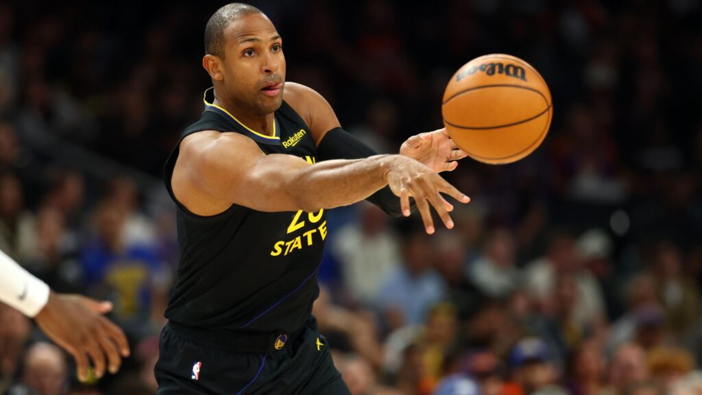 The veteran basketball player throwing the ball for a pass during one of the games
