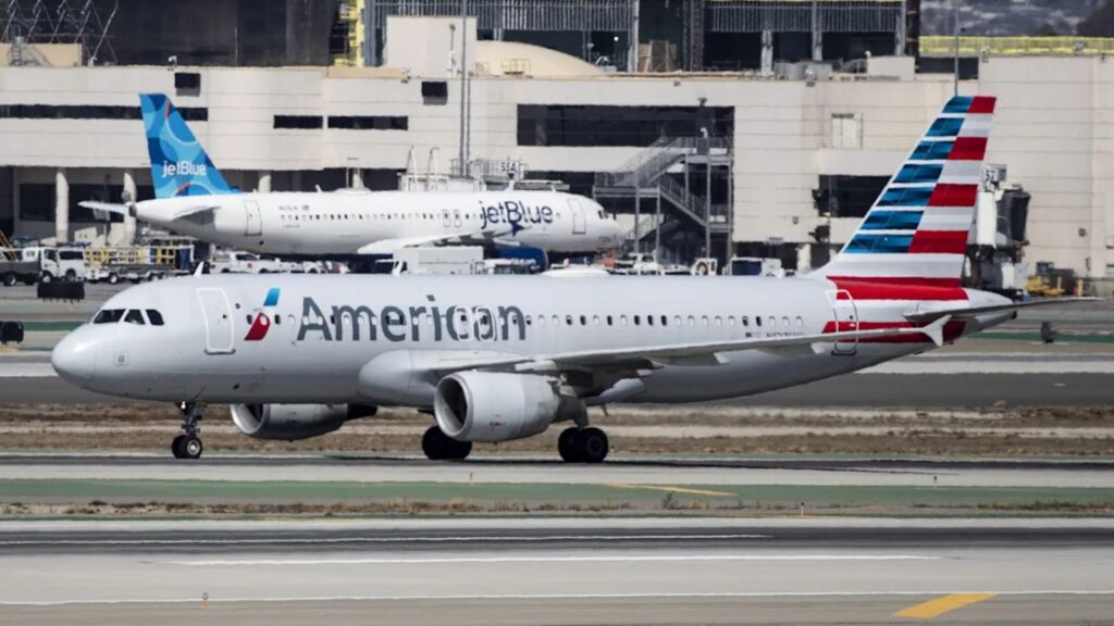 American Airlines temporarily suspends flights and offers alternatives to affected passengers An American Airlines aircraft taxiing toward the runway at a slow speed before takeoff