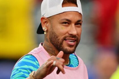 Neymar smiling while testing the pitch before a 2026 World Cup match
