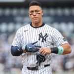 Concern grows for the Yankees after Aaron Judge's injury The New York star taking off his gloves as he prepares for his next move
