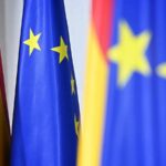 Flags of the European Union and several nations of the Old Continent waving in the wind