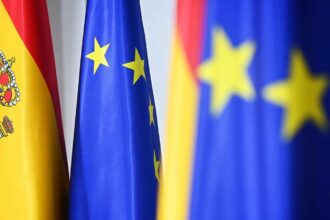 Flags of the European Union and several nations of the Old Continent waving in the wind