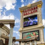 A panoramic image of the giant sign of the luxurious and eye-catching Caesars Palace hotel in Las Vegas
