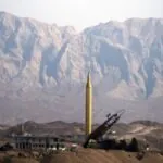 Iran threatens Israel, raising tensions in the Middle East over Beirut warning A vehicle carrying a large missile that is about to be launched