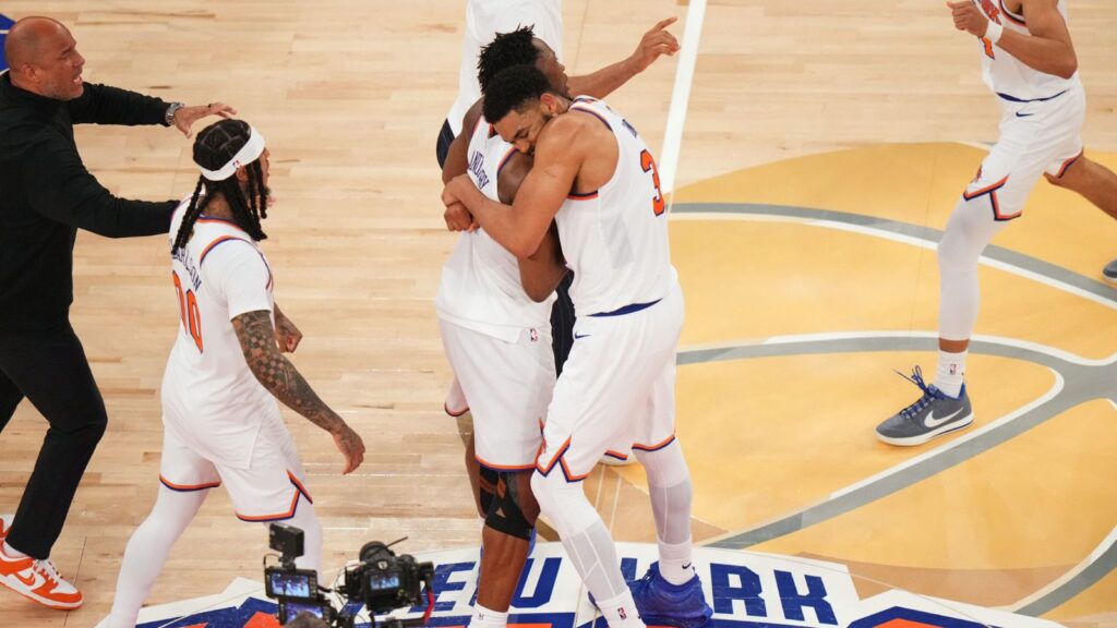 Knicks make history with an epic comeback against the Spurs Several Knicks players embracing each other while celebrating their victory in Game 4