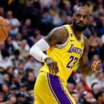LeBron passing the ball to a teammate during a game