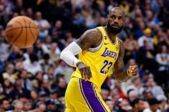 LeBron passing the ball to a teammate during a game