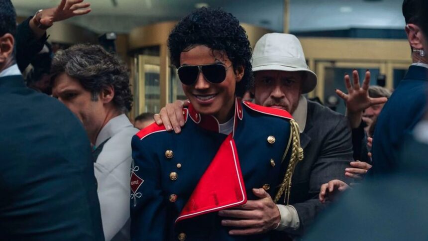 Michael Jackson surrounded by several members of his security team while leaving a stage