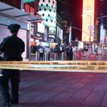 Moments of panic in Times Square after reports of gnfire and a rapid police response Several police officers cordoning off an area of Times Square following a firearm-related incident