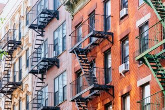 Several New York apartment buildings with their exterior fire escapes